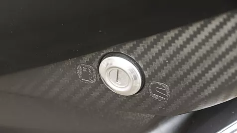 ntorq 125 seat lock release