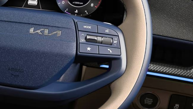 Kia Carens Clavis steering wheel closeup view